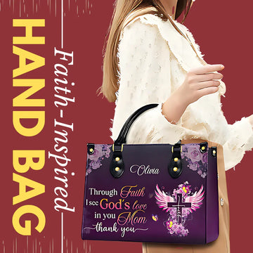 Woman holding a personalized Christian handbag with faith-inspired design and floral purple artwork